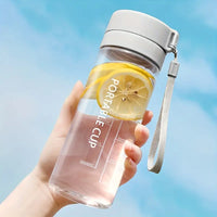 Portable Transparent Sports Water Bottle with Tea Compartment