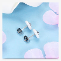 Titanium Steel Black and White Ceramic Stud Earrings